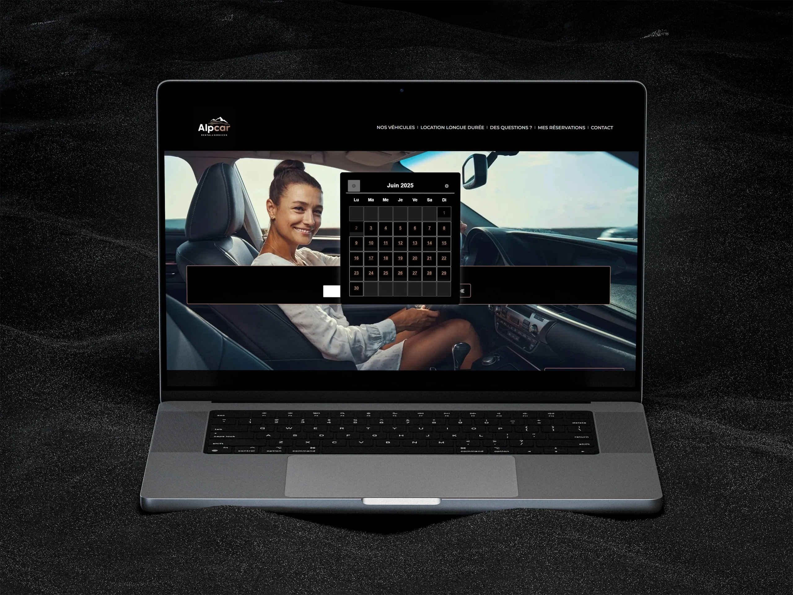Interface du calendrier de réservation sur le site alpcarrental.ch affichée sur ordinateur